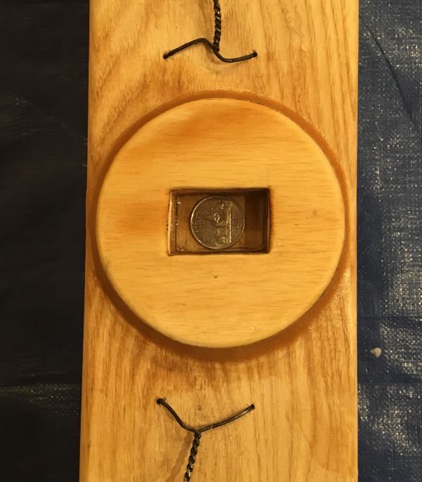 Coin Under the Mast